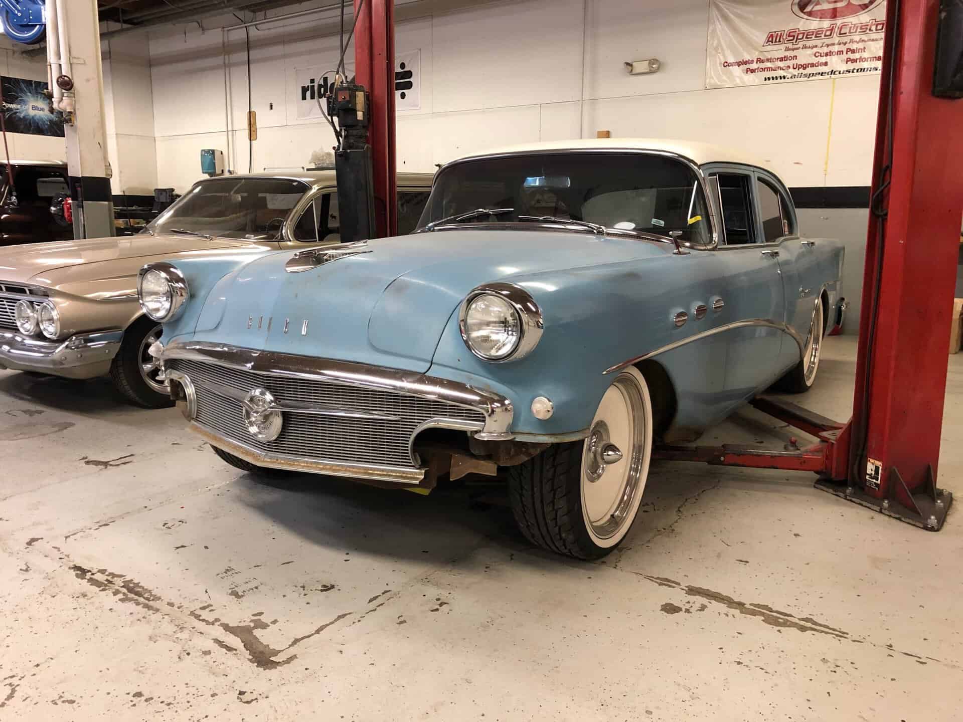 Classic vintage car restoration at All Speed Customs, specializing in custom paint and performance upgrades.