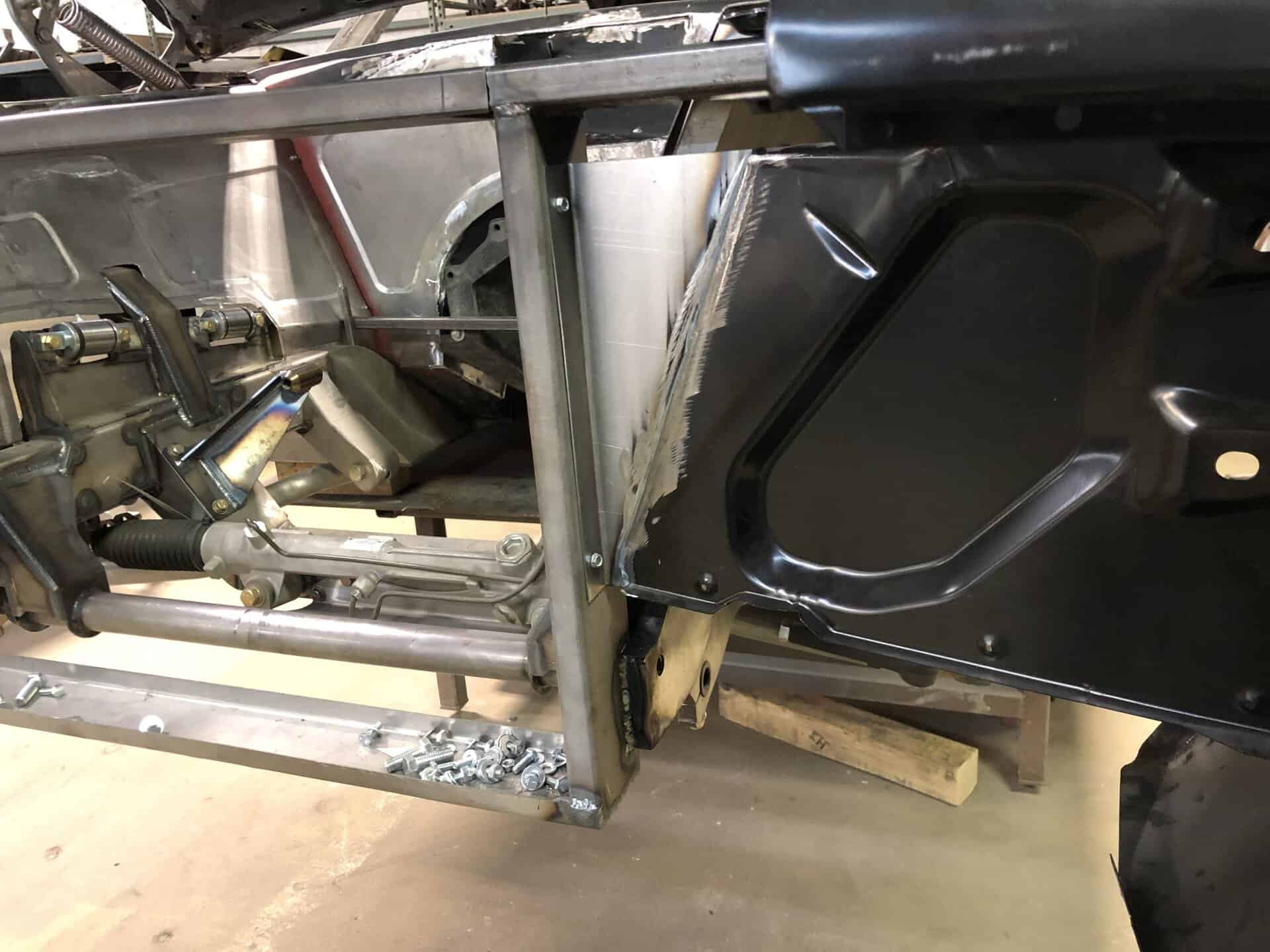 Close-up of the chassis and suspension of a 1968 Dodge Charger.
