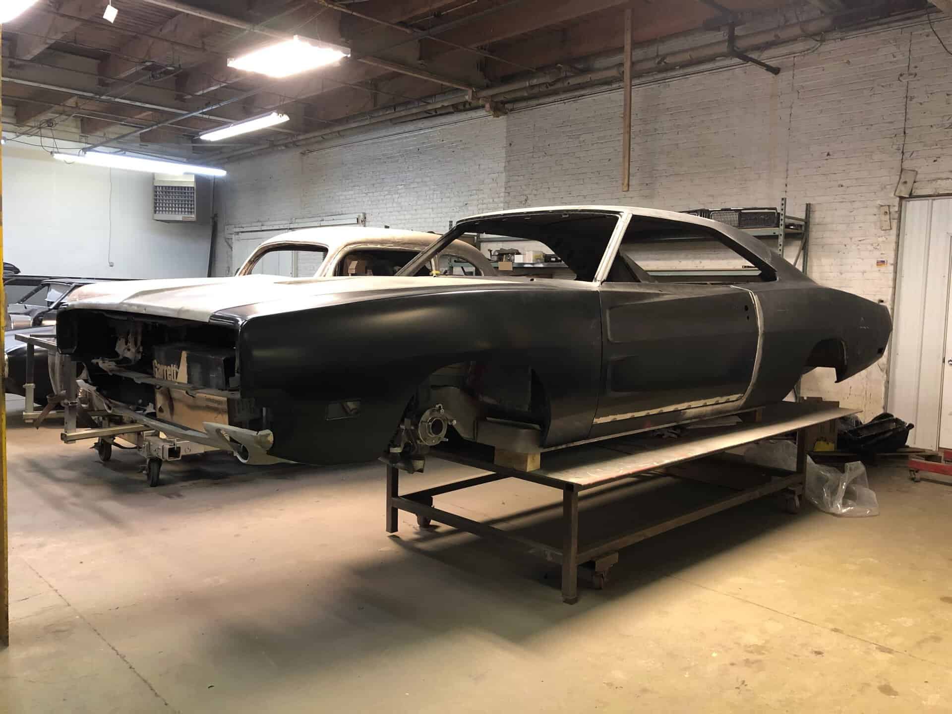 1968 Dodge Charger body shell in a workshop under restoration.