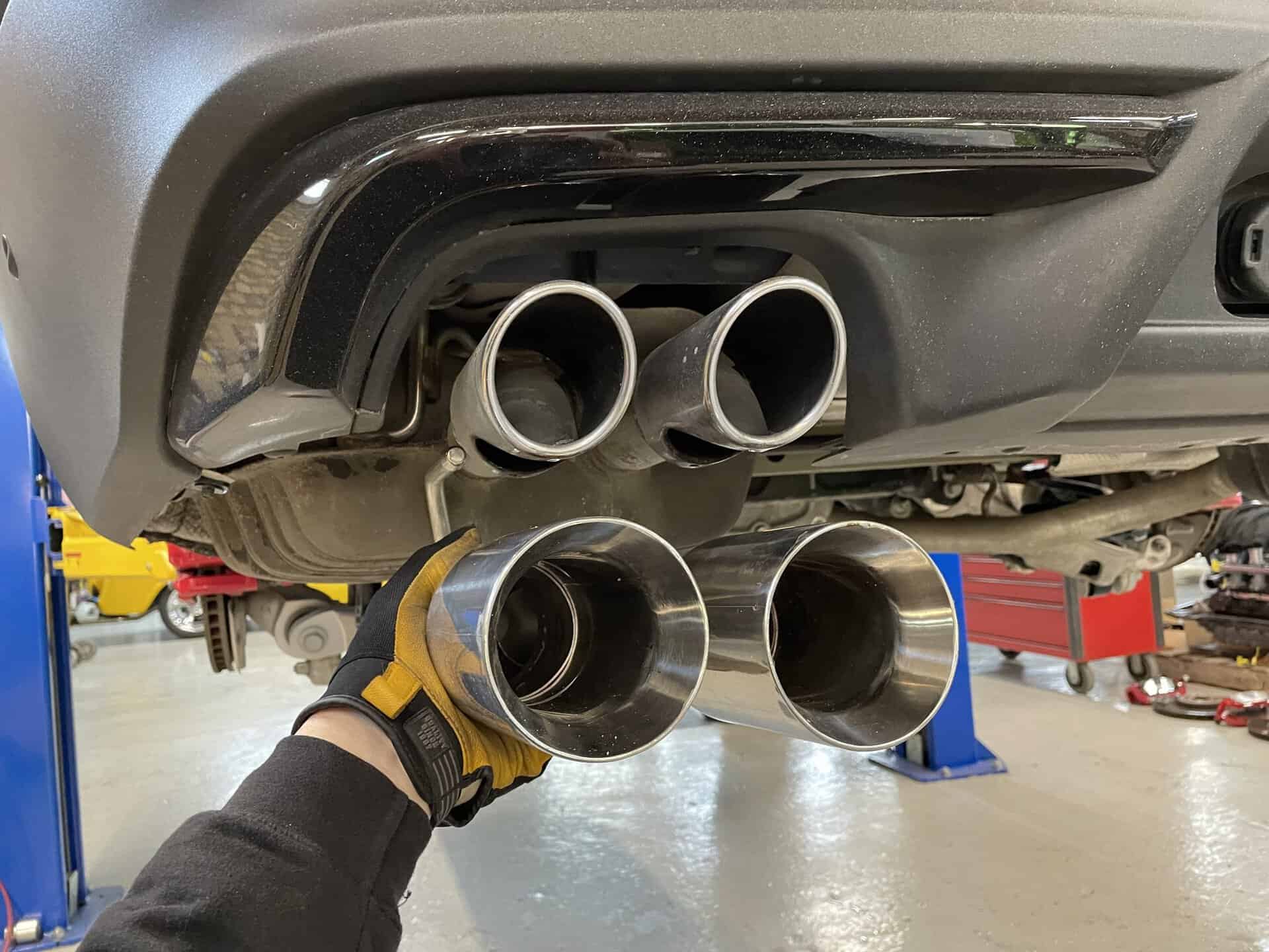 Close-up of dual exhaust tips on a 2023 Ford Explorer Sport.