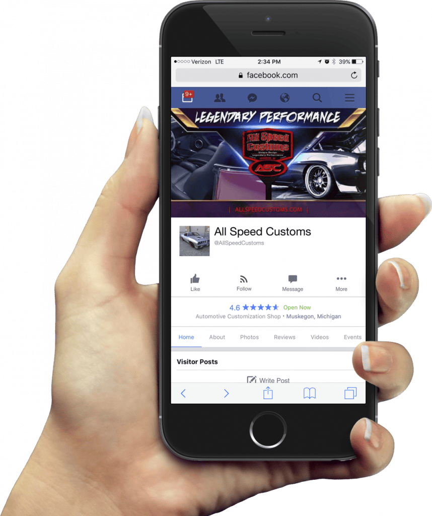 Smartphone displaying All Speed Customs Facebook page in hand.