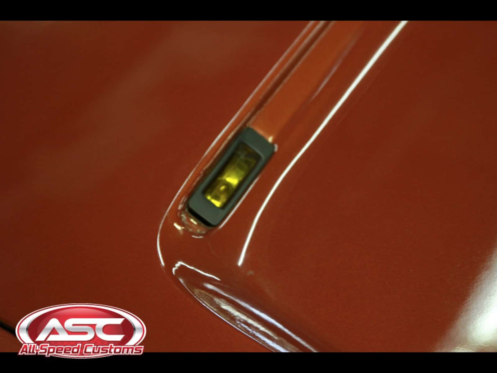 Close-up of custom paint and detailing on a 1968 Dodge Charger.