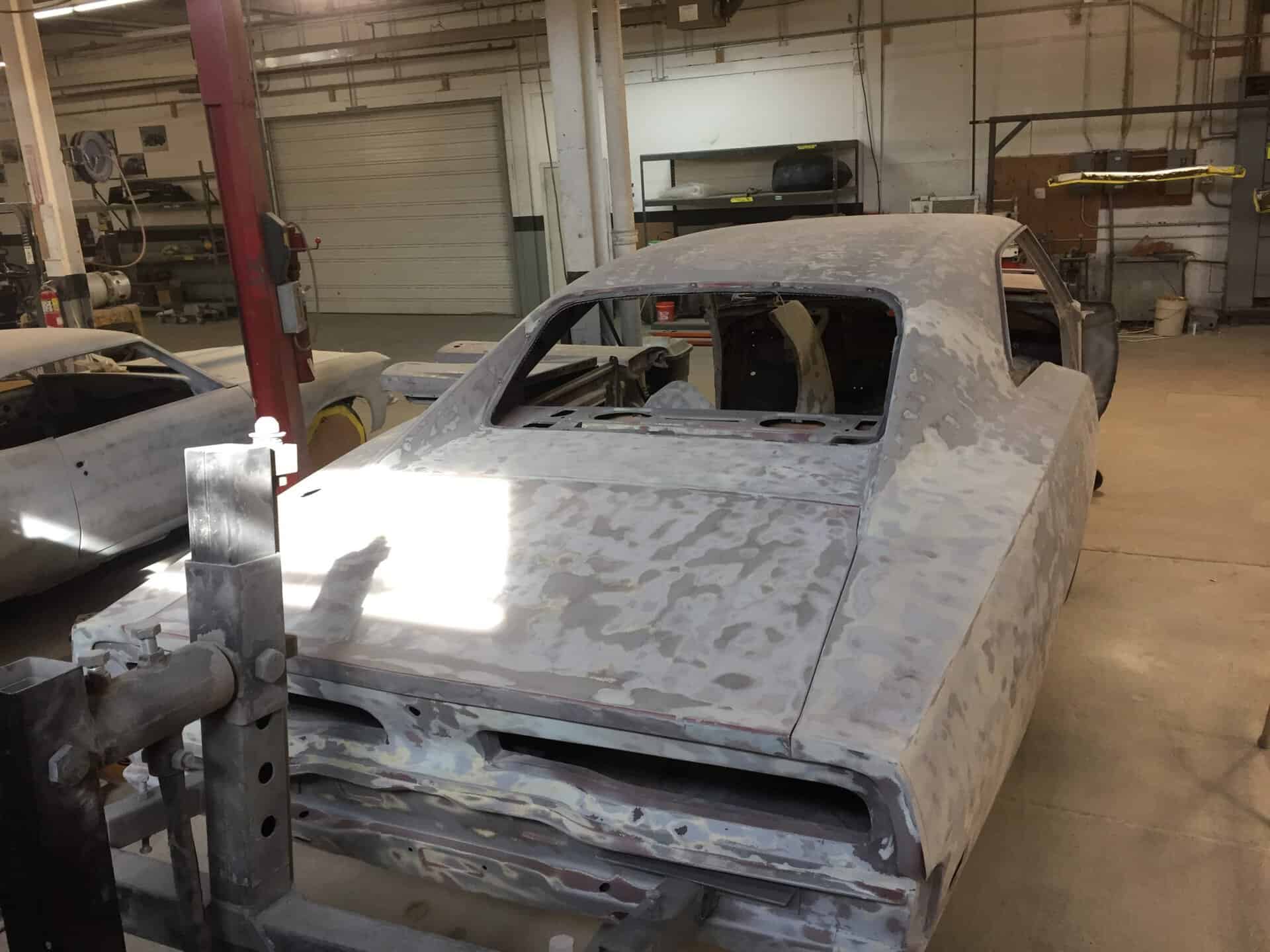 Bare metal 1968 Dodge Charger in restoration process at All Speed Customs.