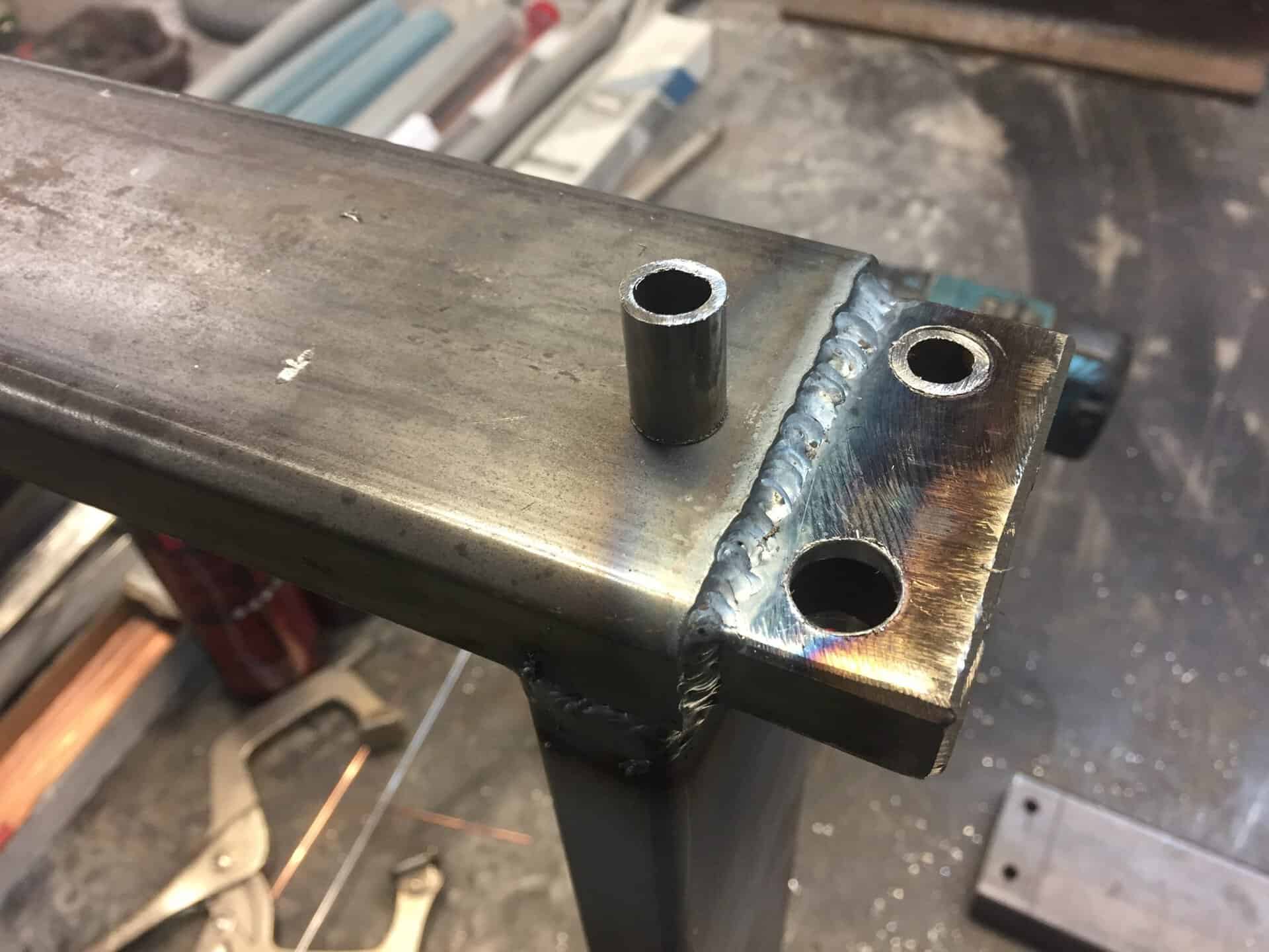 Welding and metalwork on car part for 1968 Dodge Charger restoration.