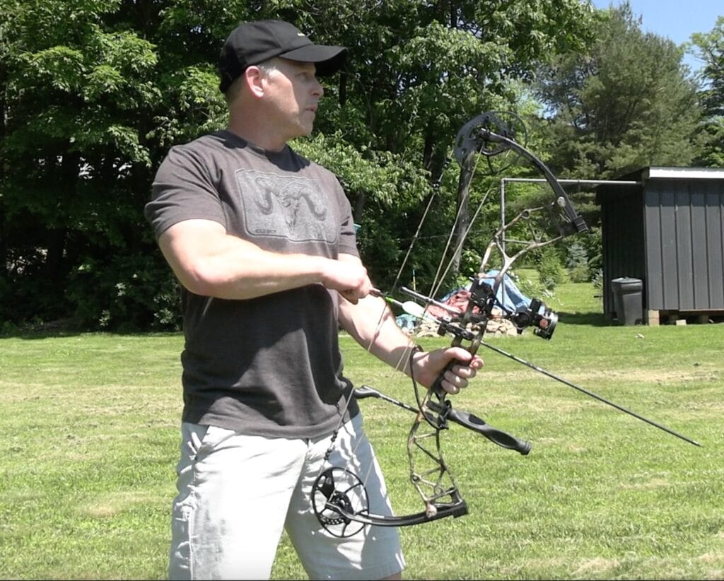 Slightly offset weaver-style shooting stance, feet facing toward the target. This is one of the alternate stances you can learn how to shoot a compound bow.