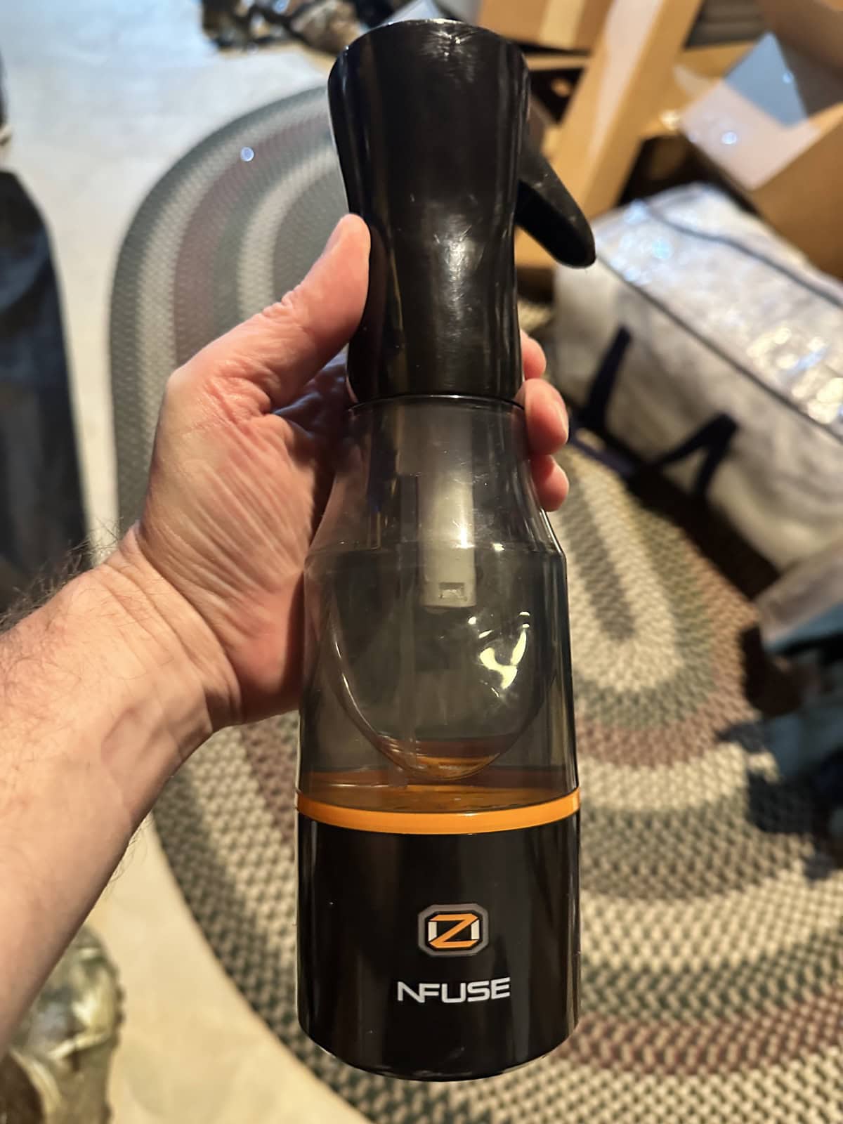 ScentLok NFuse ozone-water sprayer kept at camp and in the vehicle