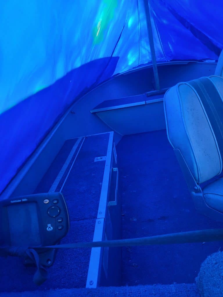 Close-up of Alumacraft Lunker 14 boat interior with seating and controls.