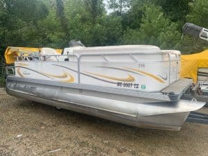 Qwest 18 Cruise pontoon boat with Yamaha engine and aluminum hull.