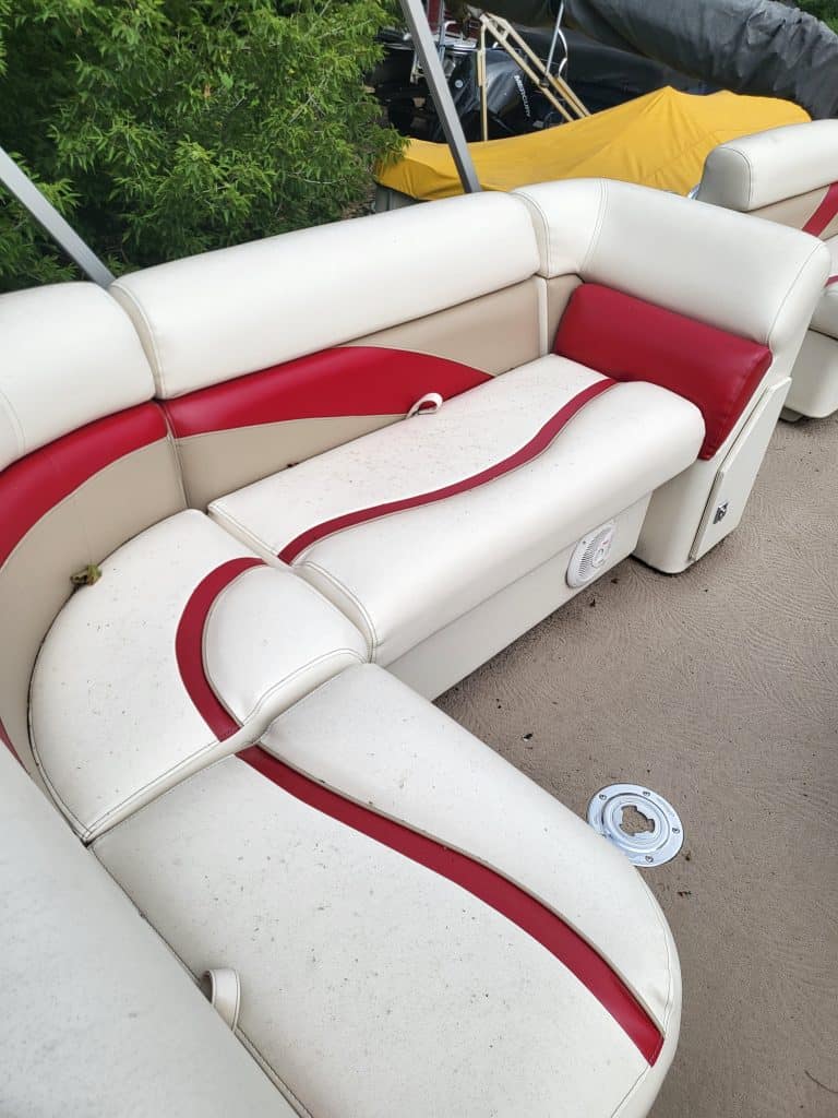White and red boat seat from a Sweetwater 23 Fish model.