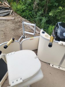 Fish finder equipment and boat accessories on a dock.