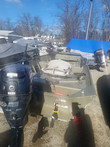 Used 2012 Lowe 15' 10 jon boat with outboard motor and accessories.
