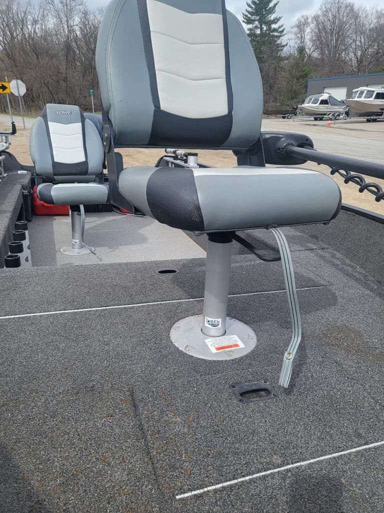 Boat seat for Lowe FM160 fishing boat, used 2016 model, with adjustable backrest and armrest.