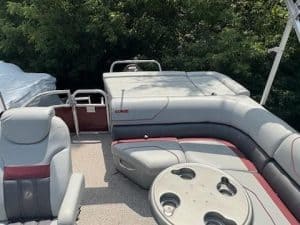 Lowe SS210 pontoon boat with seating and table for leisure boating.