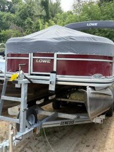 Lowe SS210 pontoon boat on trailer with cover, for sale at Camp and Cruise.
