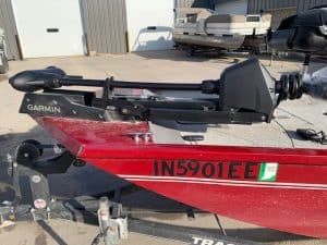 Red Bass Tracker 17 boat with Garmin fish finder and motor.