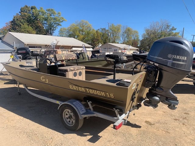 Gator Tough 18 boat with Yamaha engine on trailer for sale.
