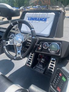 Ranger Z520C boat dashboard featuring Lowrance GPS and steering wheel.