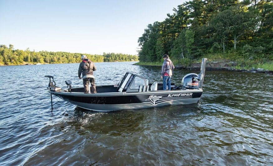 KingFisher Warrior Sport 1825 fishing boat on river with two anglers.