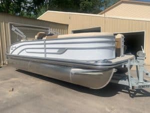 Lowe SS210 pontoon boat with Mercury 60ELPT-CT motor on trailer.
