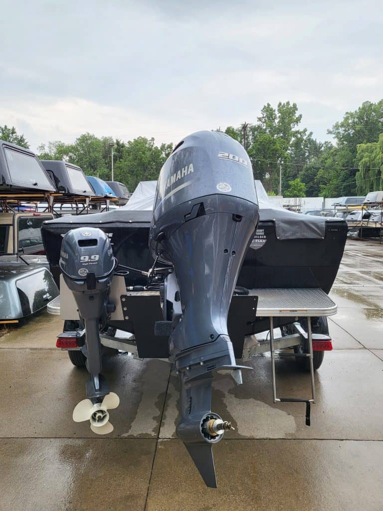 Yamaha 250 outboard motor attached to boat for sale.