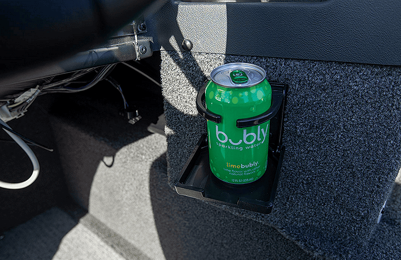 Green LimeBubly sparkling water can in boat cup holder.