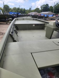 Lowe Boats RX1760 fishing boat interior with storage and controls.