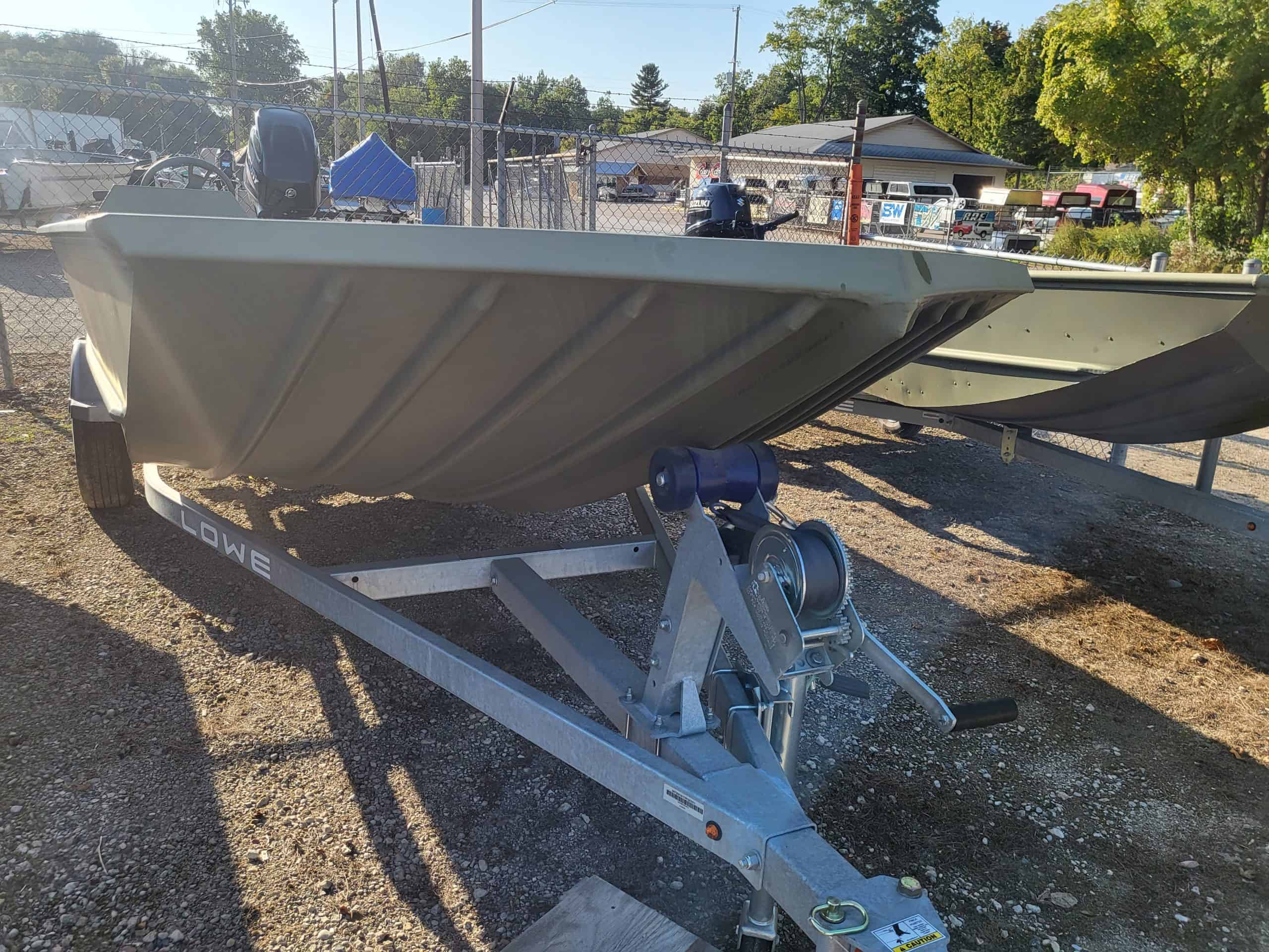 Boat trailer on display at Camp & Cruise with heavy-duty build, ideal for boat owners seeking quality trailers.