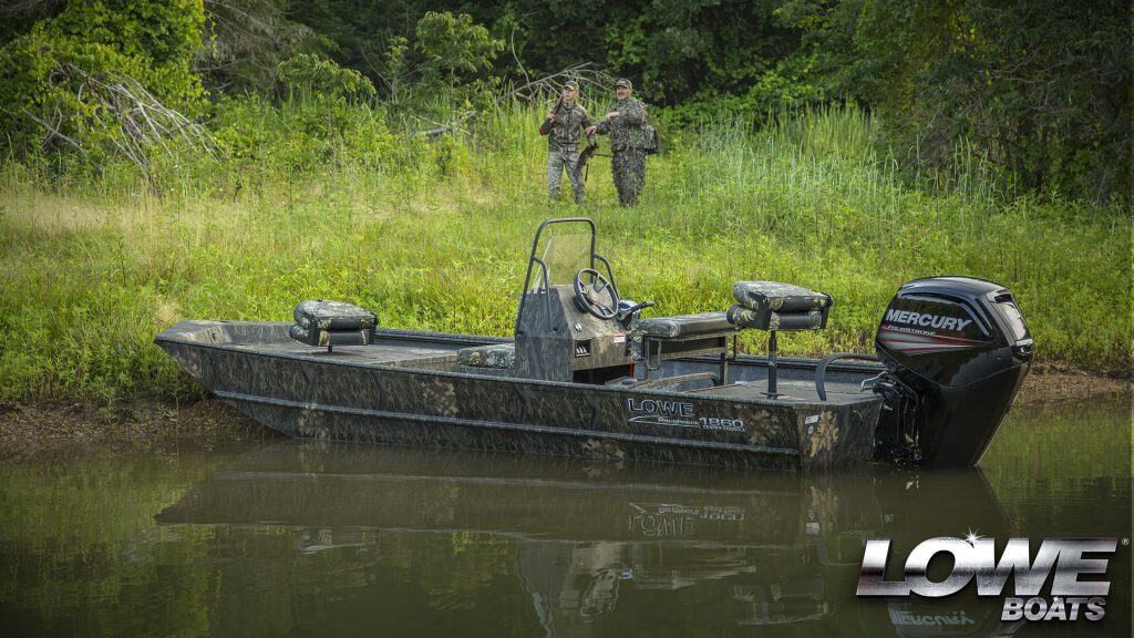 Lowe Boats RX18PT fishing boat on calm water with outboard motor.
