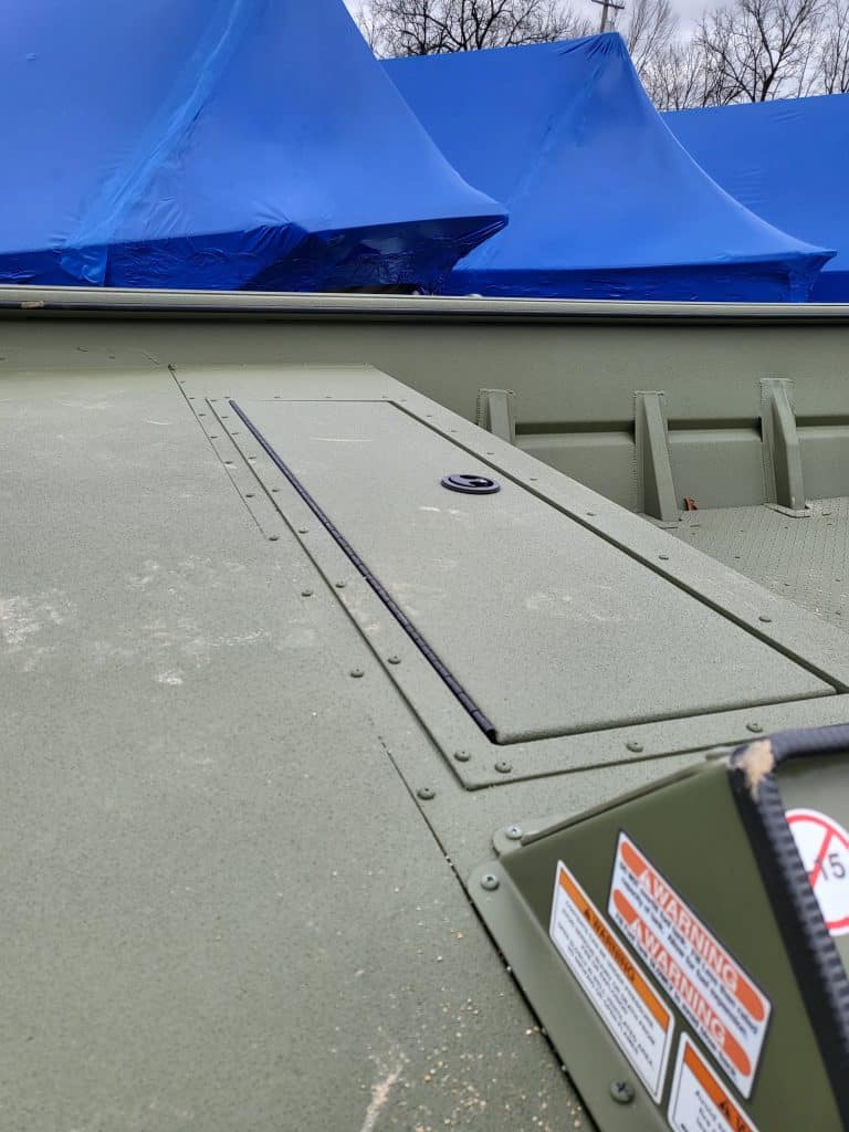 Close-up of boat deck hatch on SeaArk 2072 MVT boat.
