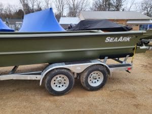 SeaArk 2472-MVT boat on trailer at Camp and Cruise.