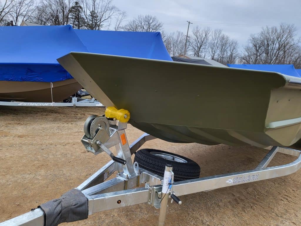 Boat trailer for SeaArk 2472-MVT with winch and spare tire.