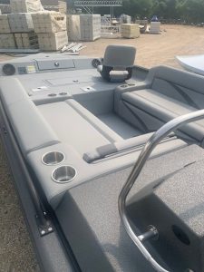Close-up of the interior seating and controls of the SeaArk Easy 200 boat.