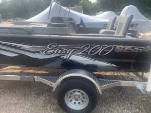 SeaArk Easy 200 fishing boat on trailer for sale.
