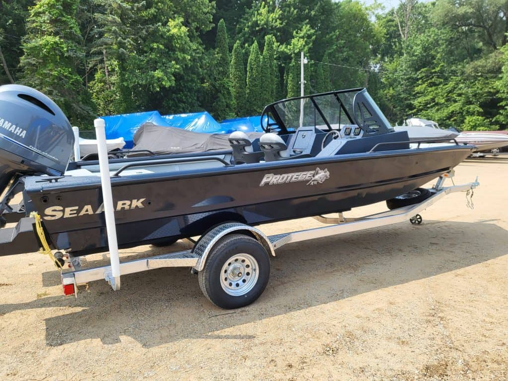 2023 SeaArk Protege boat on trailer with Yamaha outboard motor.