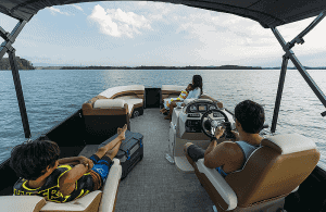 Family enjoying a boat ride on Lowe Boats SS230W in open water.