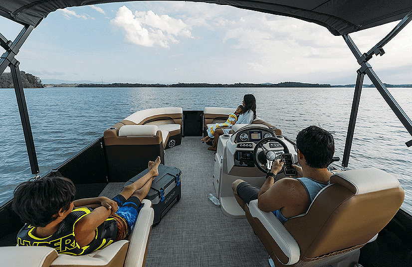 Family enjoying a boat ride on Lowe Boats SS230W in open water.