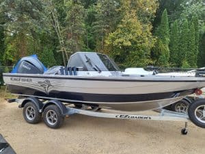 KingFisher 1925 Arrow Sport boat on trailer with Yamaha engine.