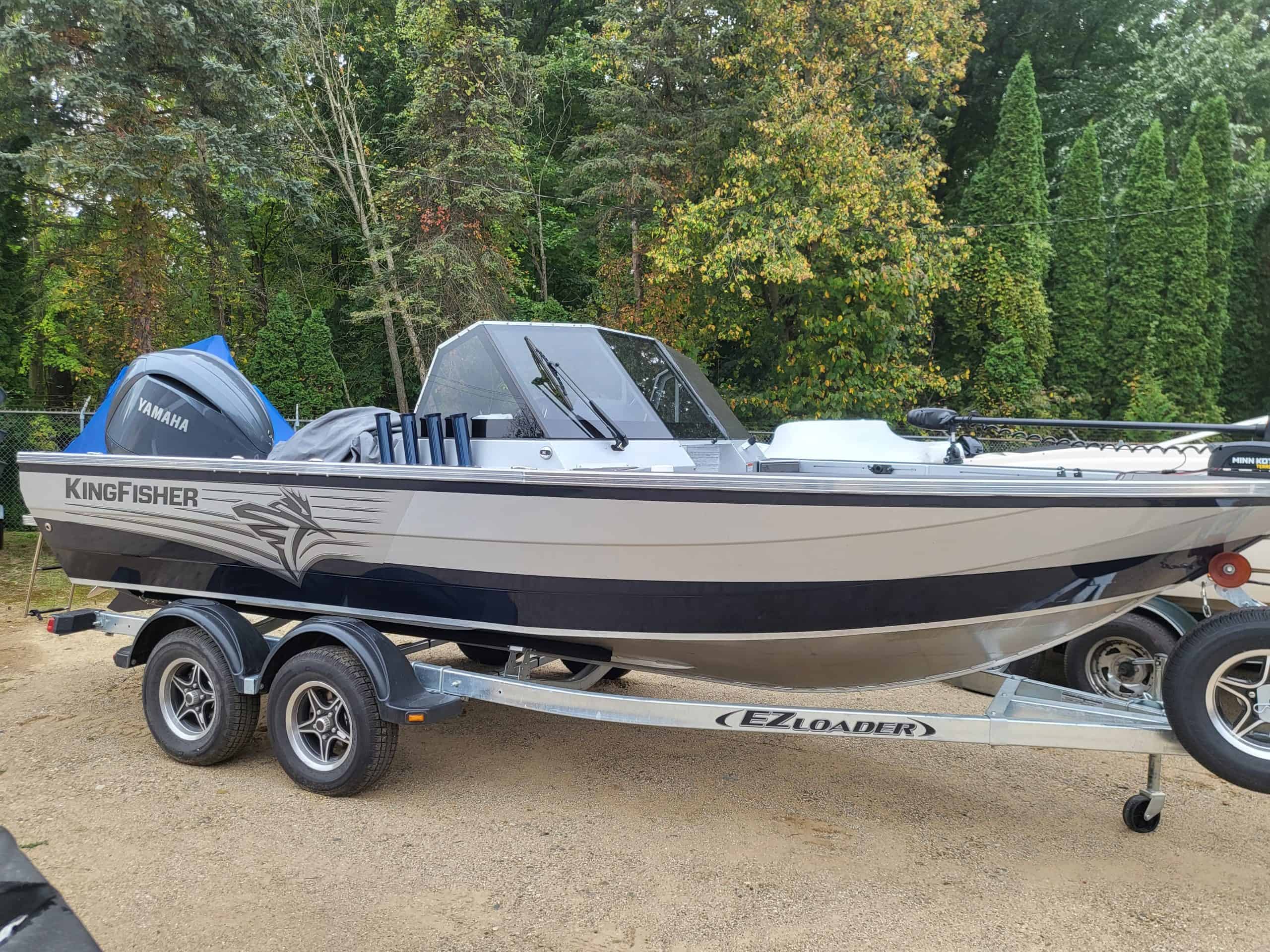 KingFisher 1925 Arrow Sport boat on trailer with Yamaha engine.