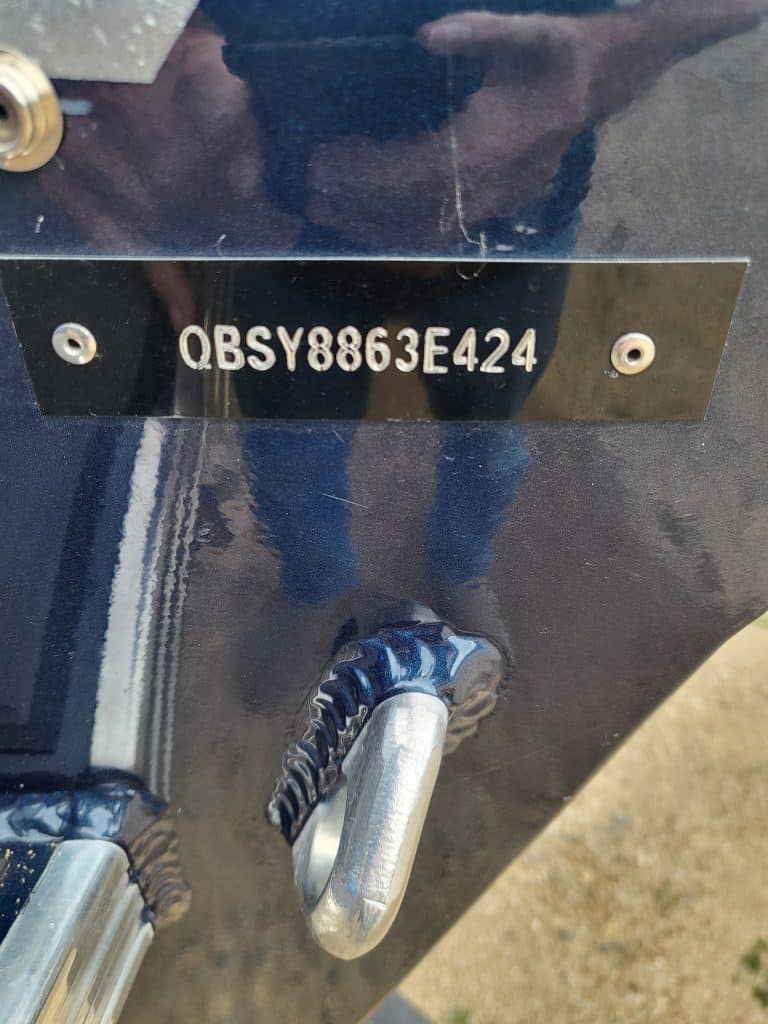 Serial number plate on KingFisher 1925 Arrow Sport boat.