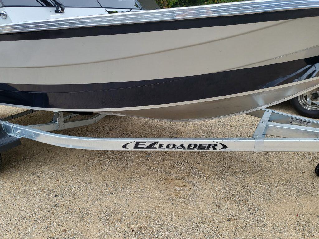 New 2024 KingFisher 1925 Arrow Sport boat on EZ Loader trailer.
