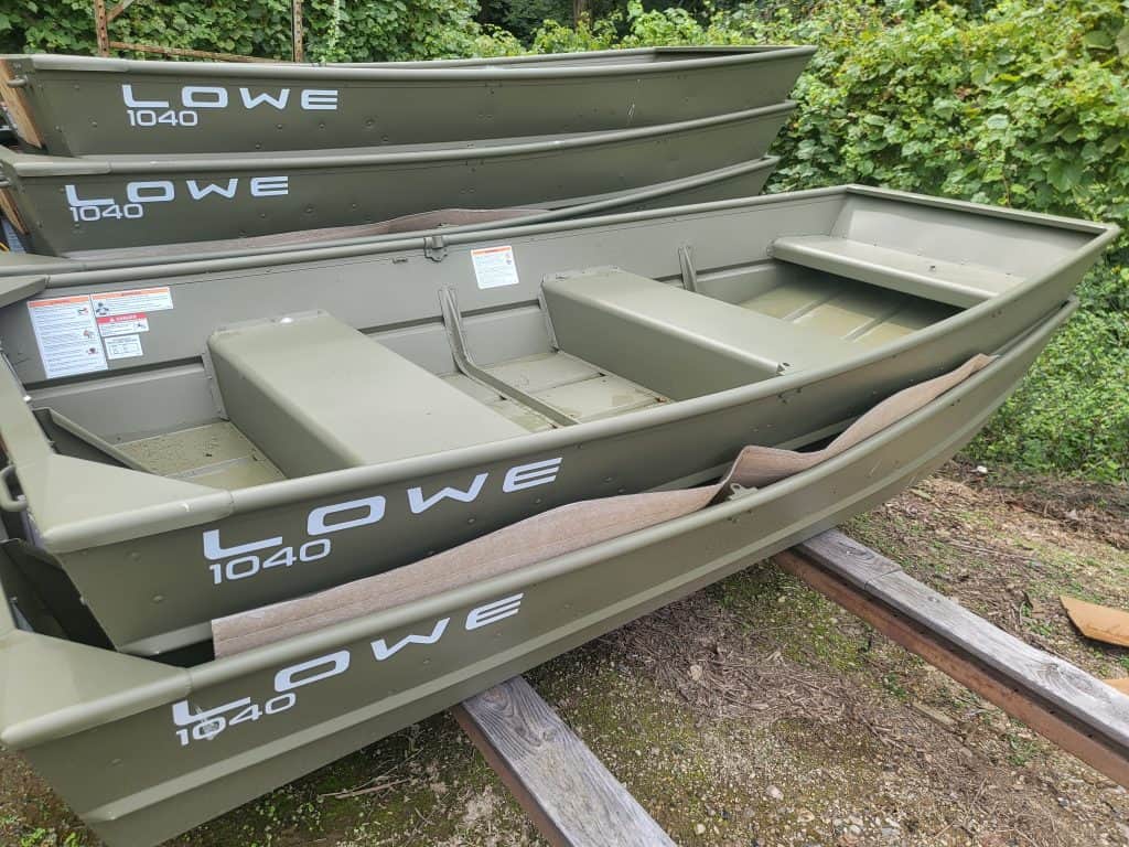 Lowe 1040 Jon boat with bench seats, ideal for fishing and outdoor activities.