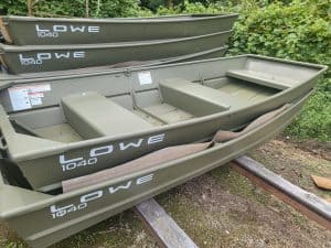 Lowe 1040 Jon boat with bench seats, ideal for fishing and outdoor activities.