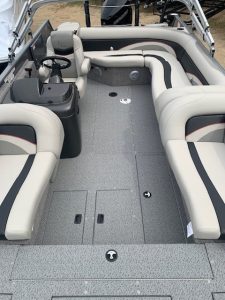 Interior view of Lowe SD 224 2024 pontoon boat with seating and steering console.
