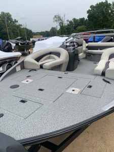 Lowe SD 224 bass boat with seating and deck area for fishing.