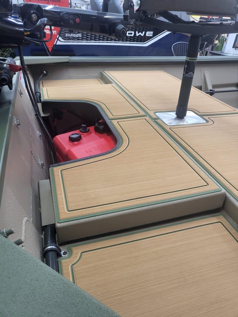 Boat deck with wooden finish and red fuel tank, SeaArk 1660 MVT 2024 model.