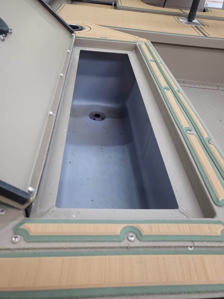 Boat storage compartment with lid for SeaArk 1660 MVT boat.