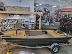 Fishing boat on trailer at Camp and Cruise store.