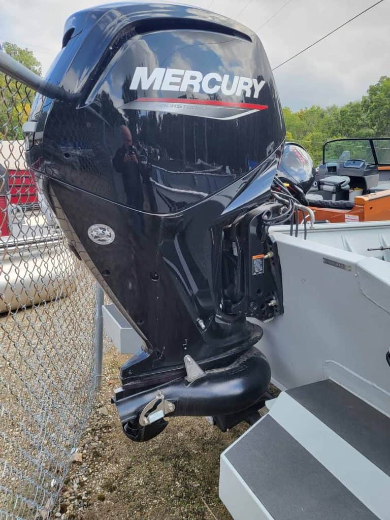 Mercury outboard motor attached to boat for fishing or recreation.
