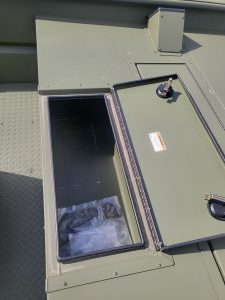 Storage compartment with clear lid on a boat for SeaArk 1872 JTCC 2024.