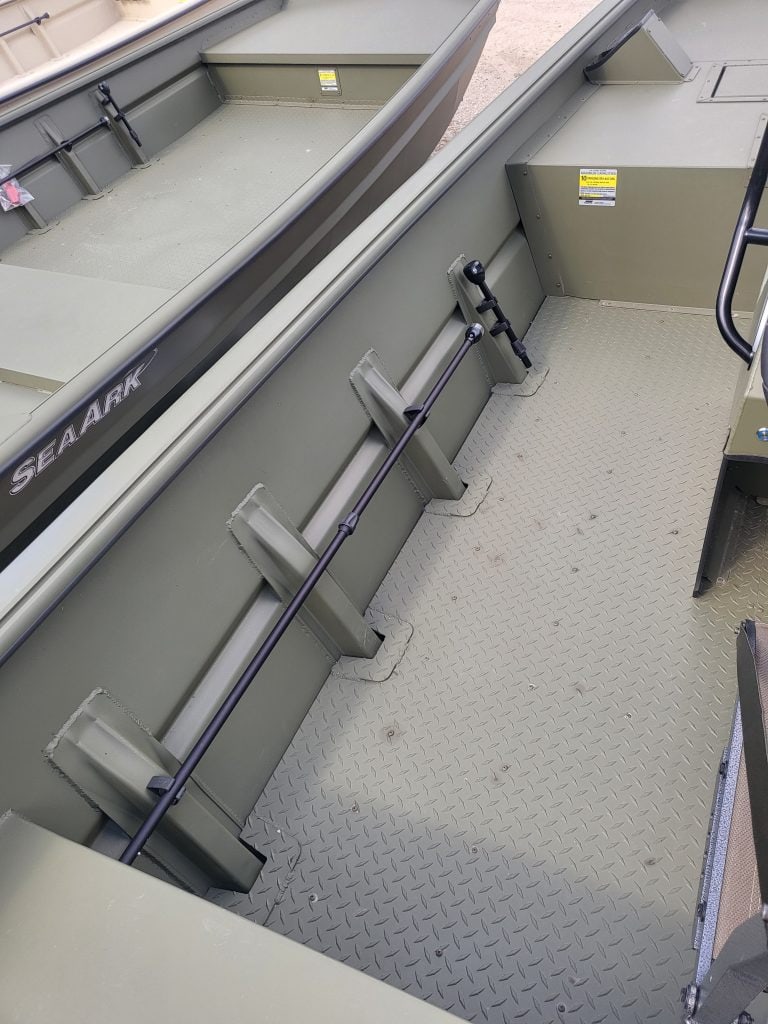 Close-up of the interior of a SeaArk 1872 JTCC boat showing the floor and side rails.